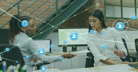 Poster - Animation of connected icons over diverse female coworkers discussing reports in office