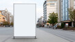 Vertical white blank billboard on the city street with copy space
