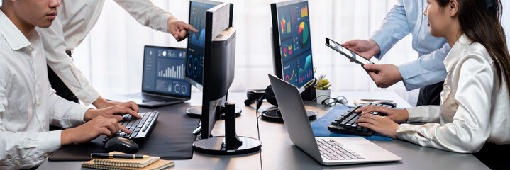 Poster - Analyst working on data analysis or BI dashboard on computer monitor. Business team analyzing financial data by Fintech in corporate office for business marketing and strategy planning. Trailblazing