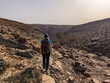Hiking through the stone desert near Amtoudi in the Anti-Atlas