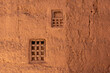 Two little windows in a typical berber house built of clay