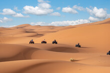 Motor Quads Driving Off-road In The Erg Chebbi Desert Near Merzouga
