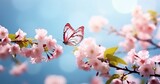 Fototapeta Desenie - A butterfly gracefully flutters over a delicate pink blossom branch in spring. Made with generative AI technology
