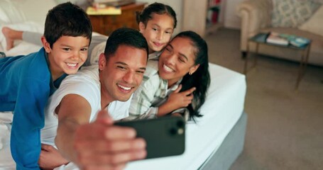 Wall Mural - Selfie, phone and family together on bed for happy portrait, memory and social media post of bonding, quality time or weekend. Morning with dad, mom and children in bedroom waking up and relaxing