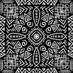 Wall Mural - African ethnic tribal seamless pattern background on black and white.