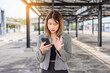© jaboo_foto - asian businesswoman use smartphone for working or shopping online outdoor