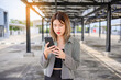 © jaboo_foto - asian businesswoman use smartphone for working or shopping online outdoor