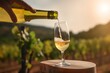 white wine from a bottle is poured into a glass on the background of vineyards .generative ai.