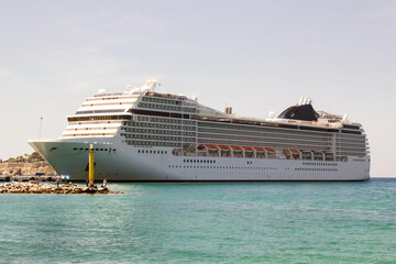 Wall Mural - Large and luxury cruise ship is moored at port in Kusadasi of Turkey