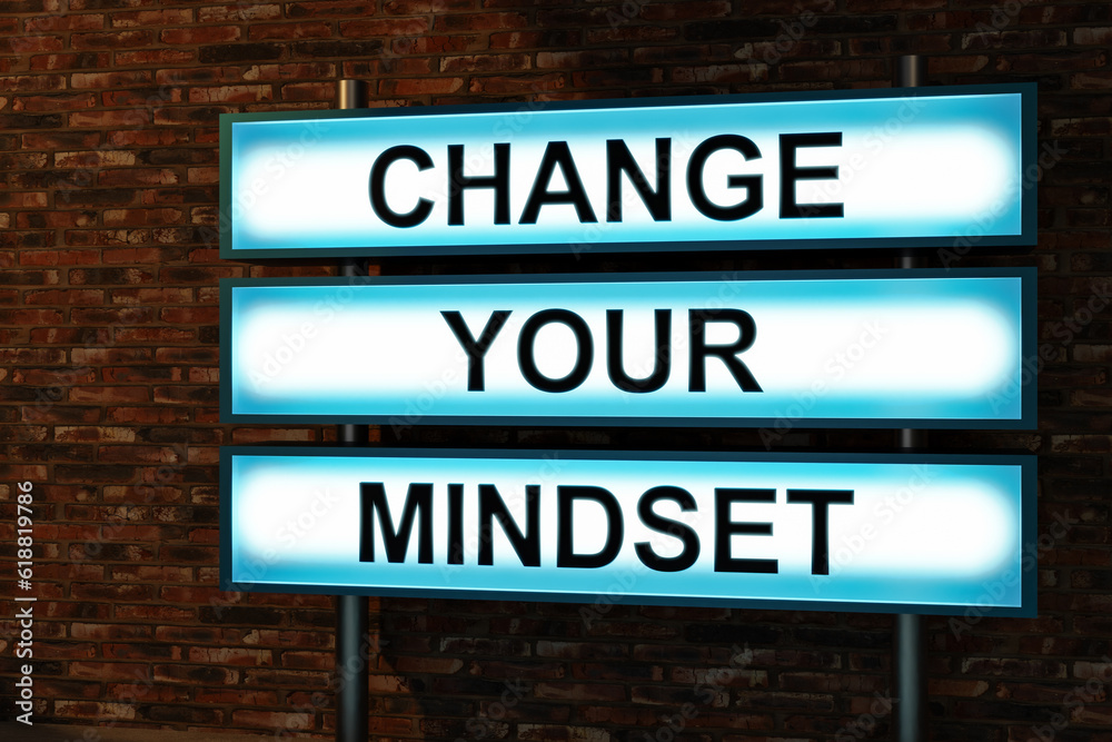 Mindset Change Signs Change your mindset. Black letters on a blue illumintaed light box, red ...