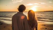 Cute Young Couple Standing And Looking The Sunset At The Beach For Pre-wedding Photoshoot. Generative Ai