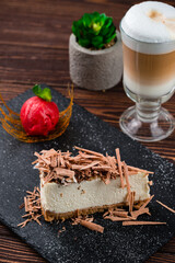 Canvas Print - Piece of vanilla cheesecake with chocolate, scoop of ice cream, mint and cup of coffee.