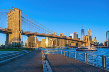 Fototapete - Manhattan's skyline with Brooklyn bridge, cityscape of New York City in the United States