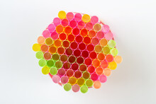 Multi-colored Plastic Straws Isolated On A White Background.