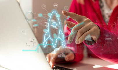 Poster - hand shows a rocket and an icon. Concept of Startup Business, Entrepreneurship Idea, and Online Digital Business. network connection on the interface Online Marketing, Technology and Success