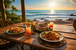 restaurant on the beach, healthy and nutritious dinner in front of the caribbean sea.