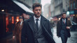 © Keitma - Suited guy in the busy city street with moody color grading