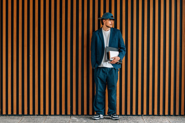 Poster - student with books in the street