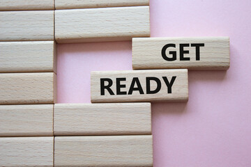 Wall Mural - get ready symbol. wooden blocks with words get ready. beautiful pink background. business and get re