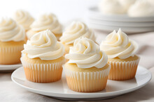Vanilla Cupcakes With Whipped Cream