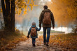 © ADDICTIVE STOCK - A man and a child walking down a leaf covered path created with Generative AI technology