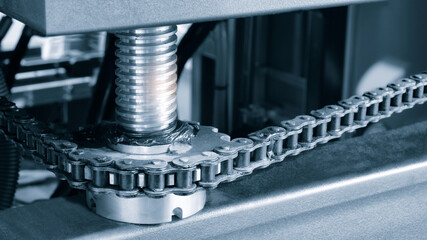 Poster - Gear chain drive shaft in conveyor belt is on production line. Timing chain of car, tensioners in engine. Industrial roller chain, technology. Team work, business industrial concept