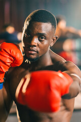 Gym atmosphere, Two professional fighters posing on the sport boxing ring. Fit muscular caucasian athletes or boxers fighting, Sport competition and human emotions concept, MMA or Thai Boxing match