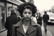 © Road Red Runner - Black and white portrait of a black woman on the street, 1950s America, photojournalistic style. Ai generated.