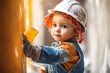 © Road Red Runner - A little girl in worker's clothing and a hard hat works on a construction site.