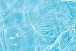 © Water 💧 Shining 📸 - Blue water with ripples on the surface. Defocus blurred transparent blue colored clear calm water surface texture with splashes and bubbles. Water waves with shining pattern texture background.