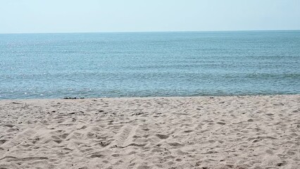 Wall Mural - slow motion scene, beautiful landscape of sea coast view on sand beach