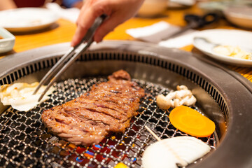 Canvas Print - Raw beef and pork slice on grill for barbecue