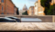 © Uuganbayar - The empty wooden table top with blur background of Rome. Exuberant image.