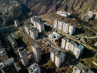 Aerial view of a city with residential buildings on a sunny day