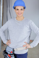 female architect in hard hat standing