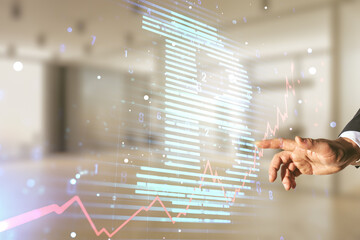 Poster - Double exposure of male hand working with creative Bitcoin symbol hologram on blurred office background. Mining and blockchain concept