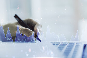 Poster - Multi exposure of abstract statistics data hologram interface with hand writing in notepad on background with laptop, computing and analytics concept