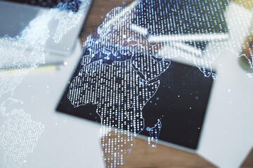 Poster - Abstract creative world map and modern digital tablet on background, top view, international trading concept. Multiexposure