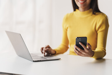 Type search information from the Internet network. Businessman working with smartphone, tablet and laptop computer on table in office. network concept