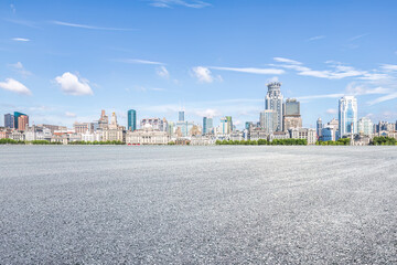 Wall Mural - Empty asphalt road and city skyline in Shanghai, China