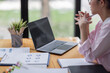 © David - Business asian women working on laptop in office, calculating income-expenditure and analyzing real estate investment data, Accounting Financial and tax systems concept.