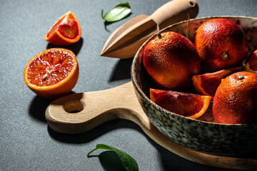 Wall Mural - red orange. Ripe blood orange slice on plate. banner, menu, recipe place for text, top view