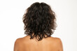 Back view head shot of beautiful curly dark wavy  hair woman against white background