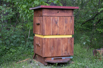 Colorful homemade bee hives - old construction