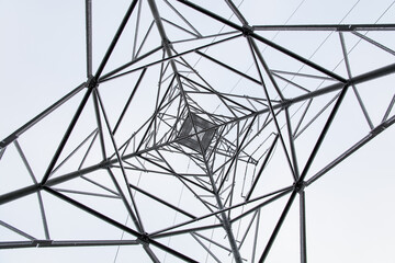  low angle view of steel framework of high voltage tower pole