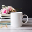 Coffee mug, a white cup on a table with books and flowers. Styled photo, product mockup