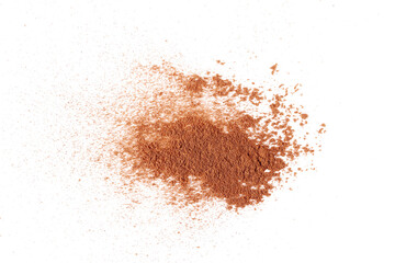 Wall Mural - Pile cinnamon powder isolated on white, top view