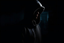 Hacker In The Hood Silhouette In The Dark,ai Generated