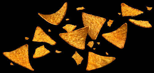 Canvas Print - Falling corn chips, hot Mexican nachos isolated on black background