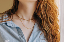 Female Neck With Elegant Golden Chain Necklace